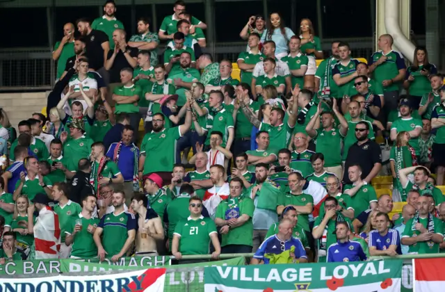 The action on the pitch might be a bit dull, but in the stands the Northern Ireland fans always find a way to have fun.