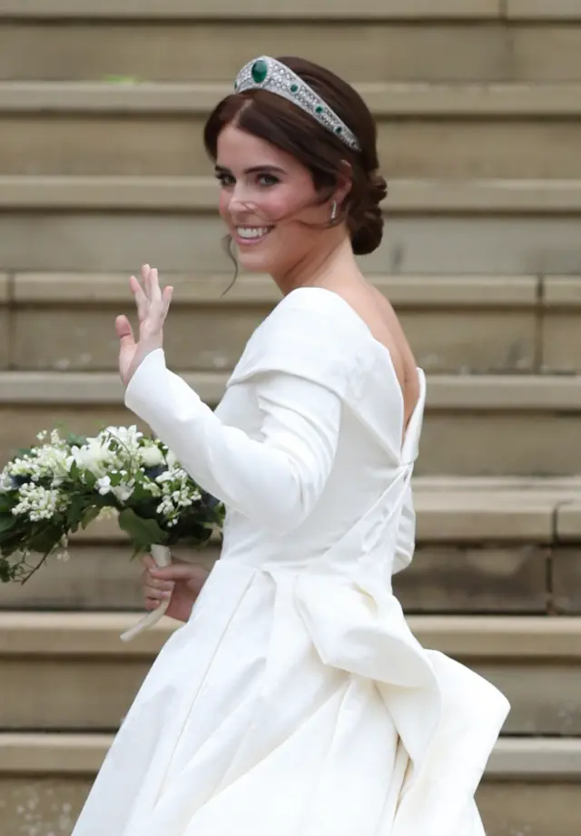 Princess Eugenie waves to the crowd