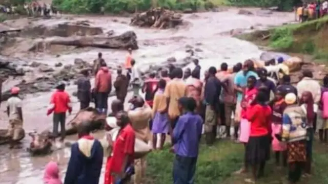 A handout photo released by Uganda Red Cross on October 11, 2018, reportedly shows the damage after a river burst its banks in the eastern town of Bukalasi, in Uganda"s Bududa district.