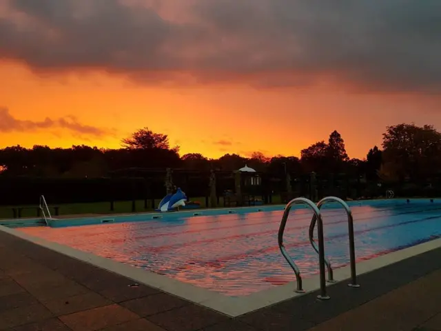 Sunrise over the outdoor pool in Woodhall Spa