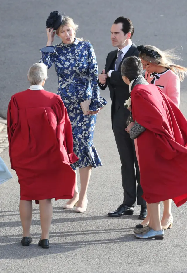 Guests struggling in the wind at Windsor Castle