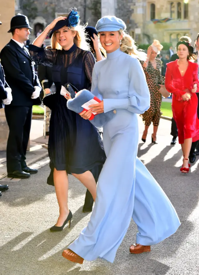 Chelsy Davy (left) and a guest arrive for the wedding