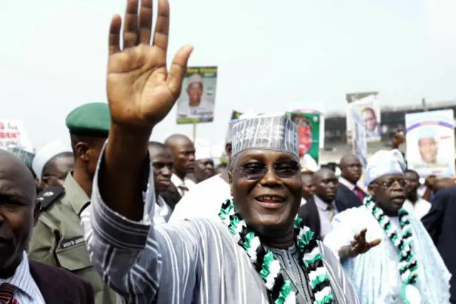 Nigerian Vice President Atiku Abubakar waves at supporters 20 December 2006