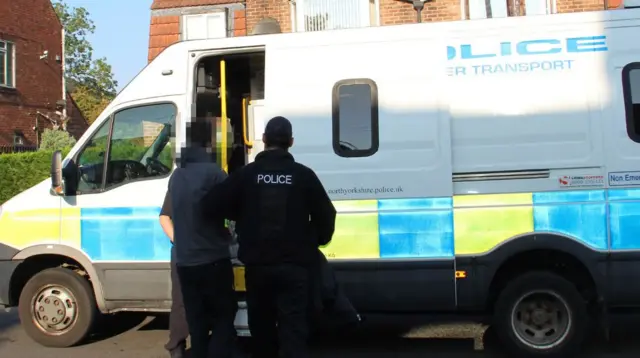 A suspect being arrested in York