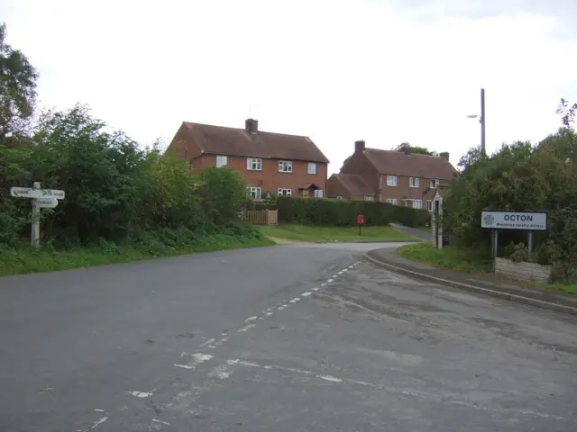 A road sign saying Octon on a junction in the village