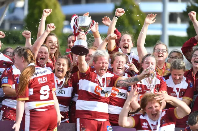 Wigan celebrate their Grand Final win against Leeds