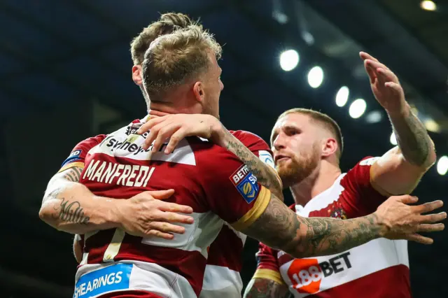 Wigan players celebrate