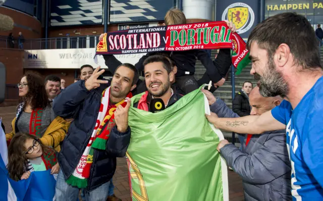 Portugal fans in a good mood outside Hampden