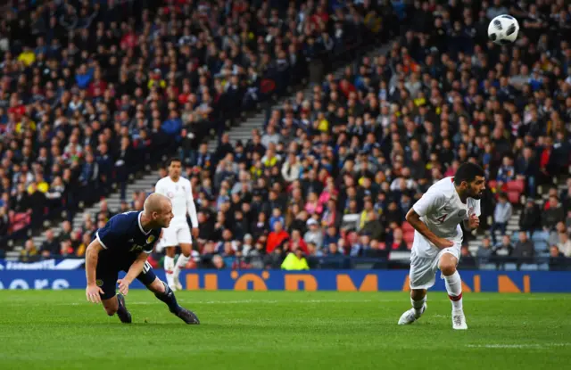 Steven Naismith heads towards goal