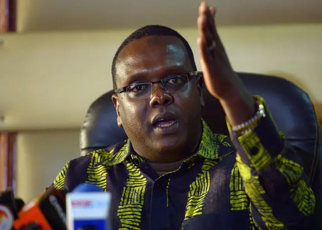 Hassan Wario gestures as he speaks during a press conference on February 19, 2016 in Nairobi