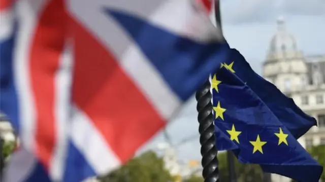 The Union Flag and the European Flag flying