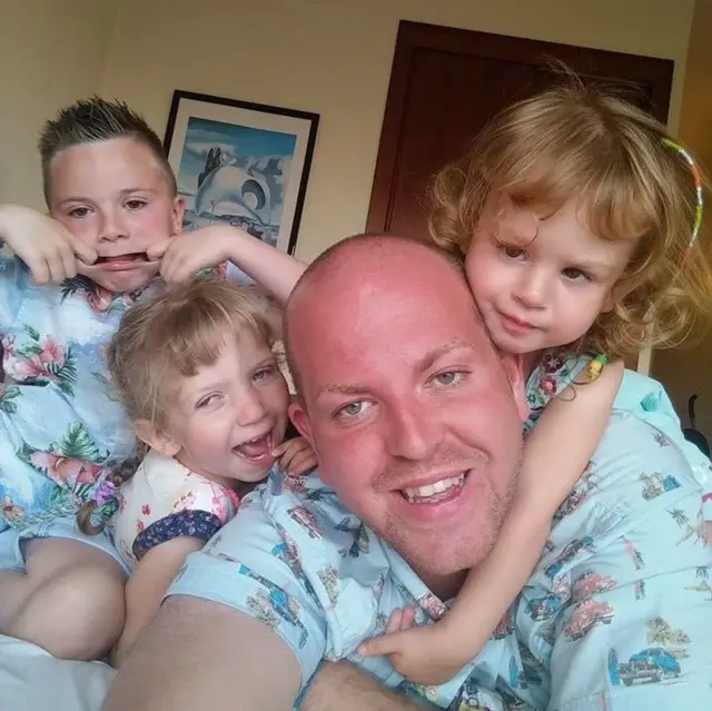 Ben Carpenter with three of his children