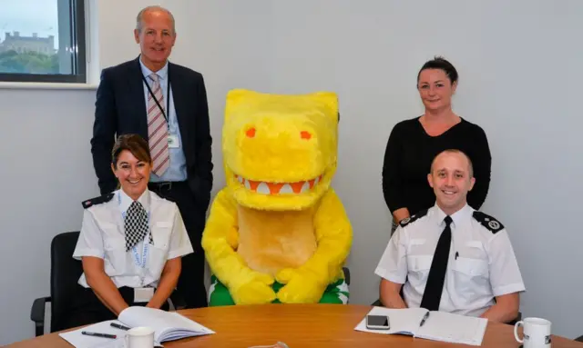 Team and dinosaur Pantosaurus