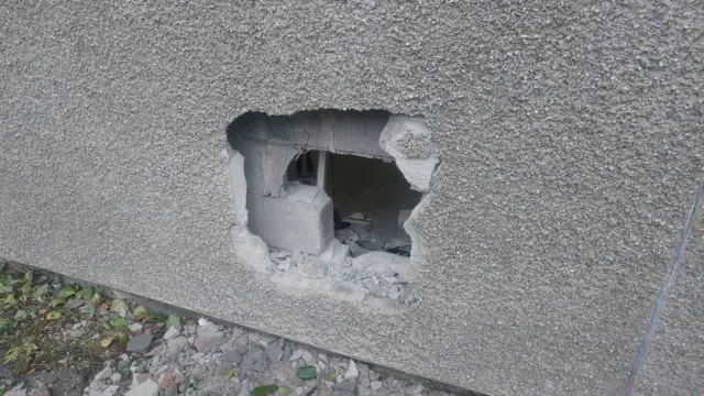 hole in shop wall