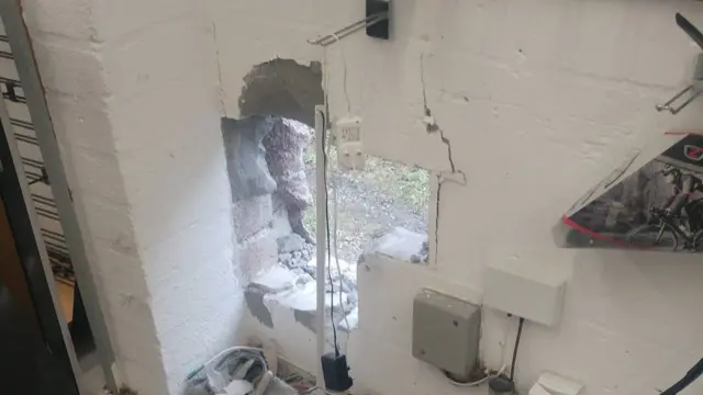 hole in shop wall