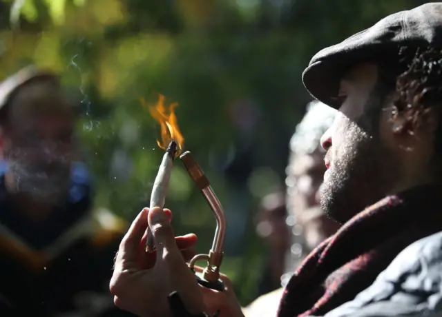 a huge joint being lit