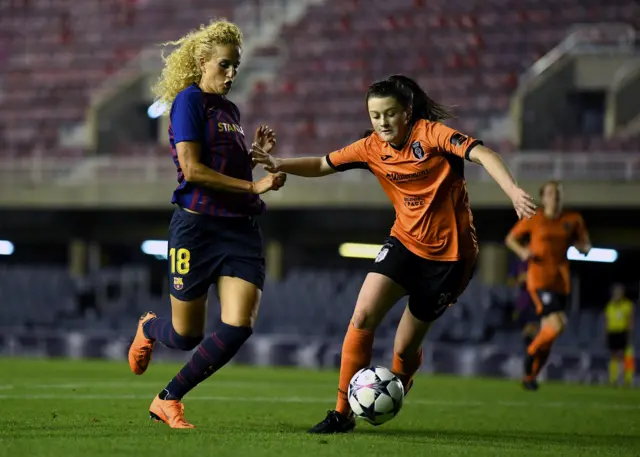 Carly Girasoli of Glasgow City battles for possession with Kheira Hamraoui