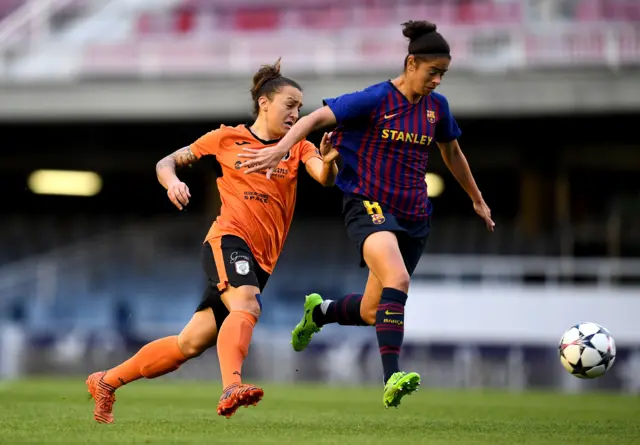 Marta Torrejon of Barcelona is challenged by Lidija Kulis of Glasgow City