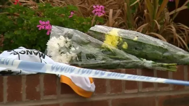 Floral tributes left at the scene