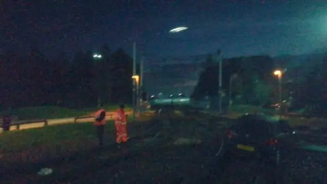 A car on the tram tracks