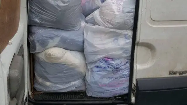 Van full of charity bags