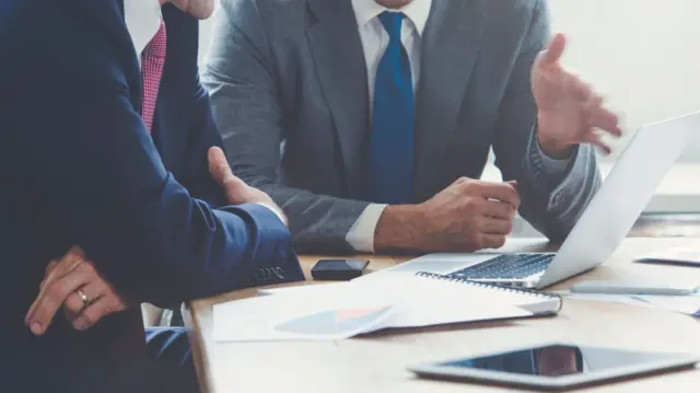 Two men in a meeting