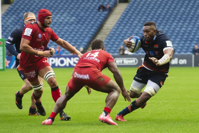 Viliame Mata runs with the ball for Edinburgh