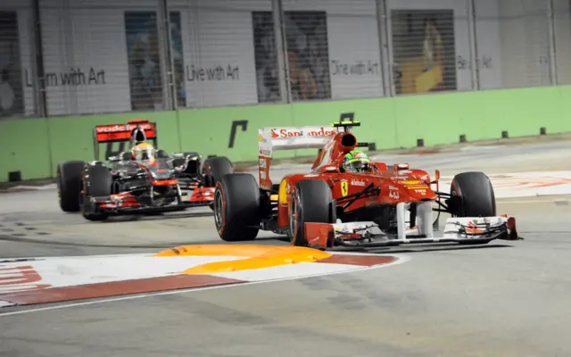 McLaren's Lewis Hamilton and Ferrari Felipe Massa at the 2011 Singapore Grand Prix