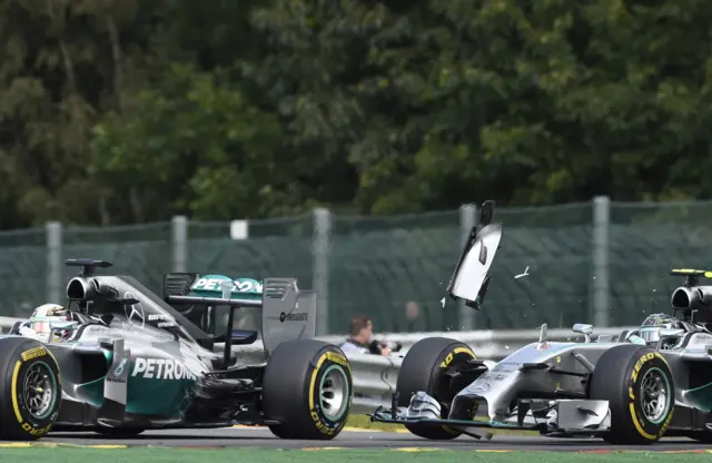 Mercedes' teammates Nico Rosberg and Lewis Hamilton collide