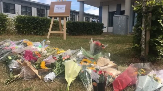 Flowers outside the hospital, laid after her disappearance