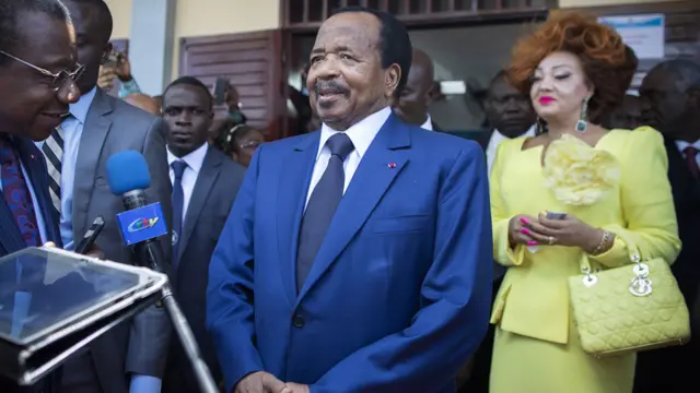 Paul Biya outside polling station