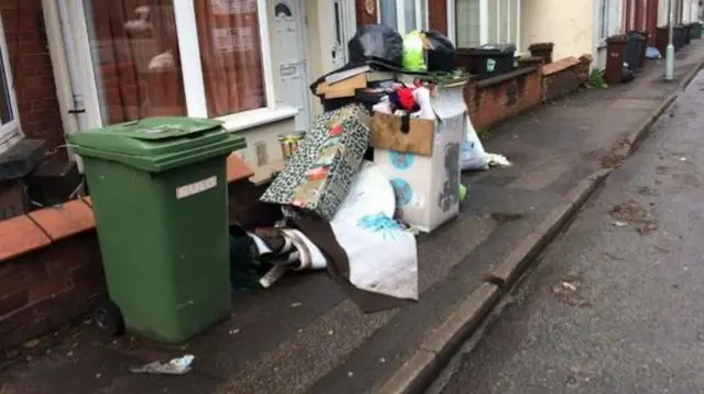 Fly-tipping next to bin in Wednesfield