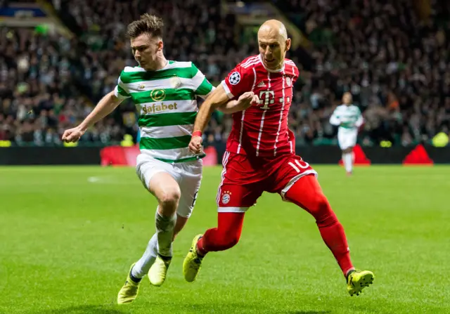 Kieran Tierney keeps and eye on Arjen Robben