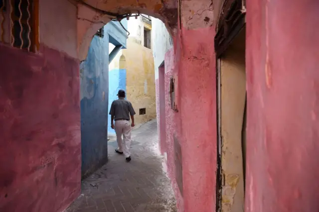 A man walks in the Old City of Morocco's port city of Tangiers, on August 13, 2018