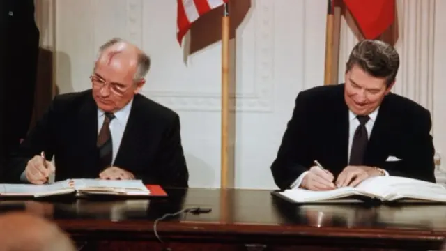 Soviet leader Mikhail Gorbachev and US President Ronald Reagan signing the INF treaty in 1987