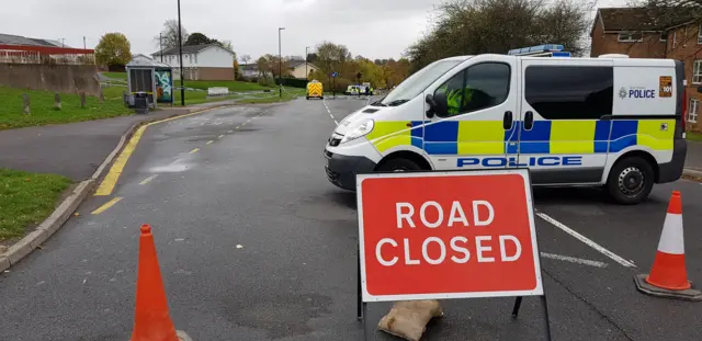 Dyche Lane with police cars