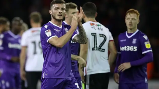 Stoke City"s Tom Edwards greets the fans after the final whistle