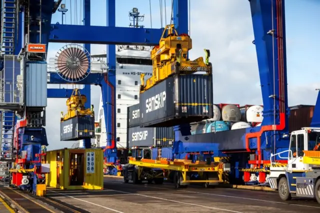 Sanskip containers being loaded onto a boat