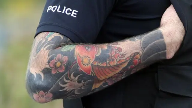 Police with tattoos