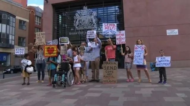 Campaigners against the cuts held a protest outside the High Court in Bristol in July ahead of the hearing