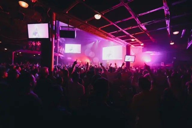 A congregation inside a Hillsong Church