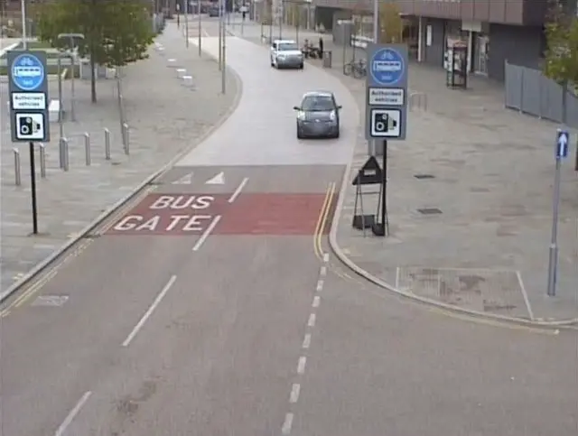 Road with bus gate signage