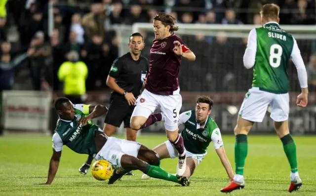 Marvin Bartley is the first player to be booked at Tynecastle