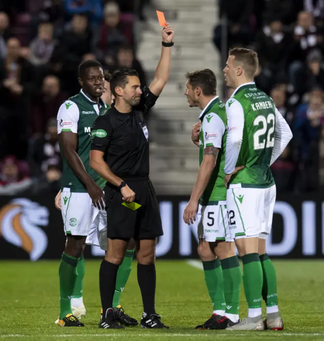 Florian Kamberi is sent off by referee Andrew Dallas at Tynecastle