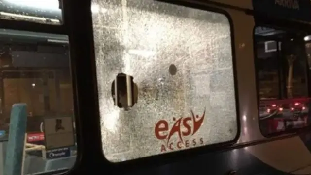 A broken bus window