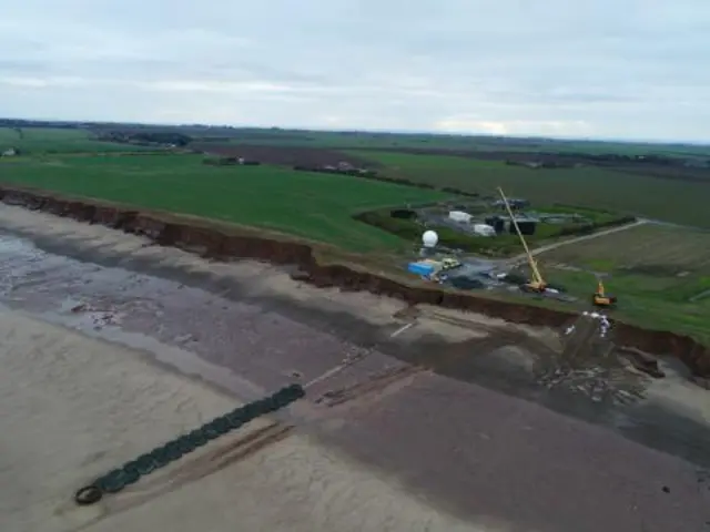 Sewage treatment works close to cliffs