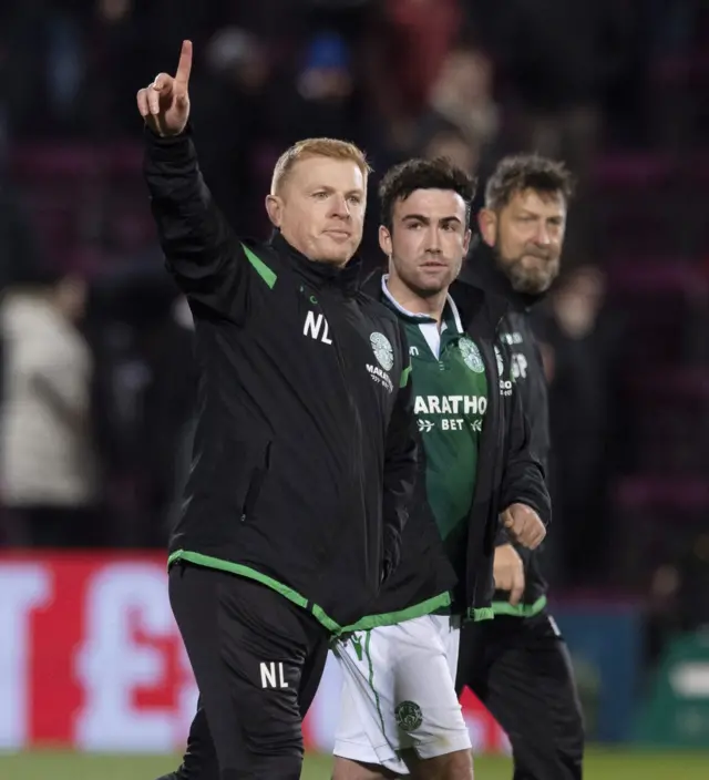 Hibs manager Neil Lennon salutes the visiting fans at the end of the Edinburgh derby