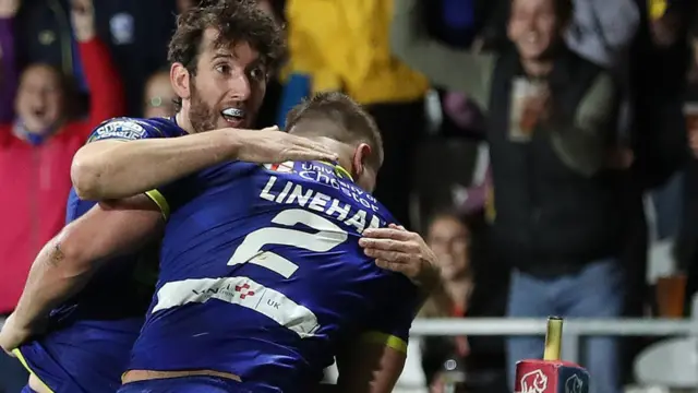 Tom Lineham celebrates a try