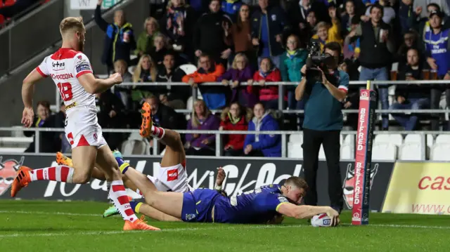 Tom Lineham of Warrington Wolves scores his sides second try