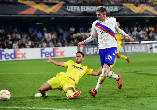 Kyle Lafferty scored a 76th-minute equaliser for Rangers in Spain